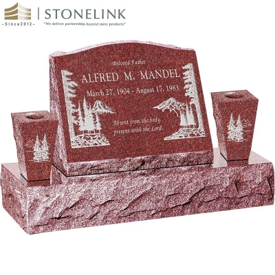 Granite slant headstone with vases